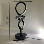 Lámpara de Escritorio LED Hércules Minimalista apagada sobre un buró junto a la cama