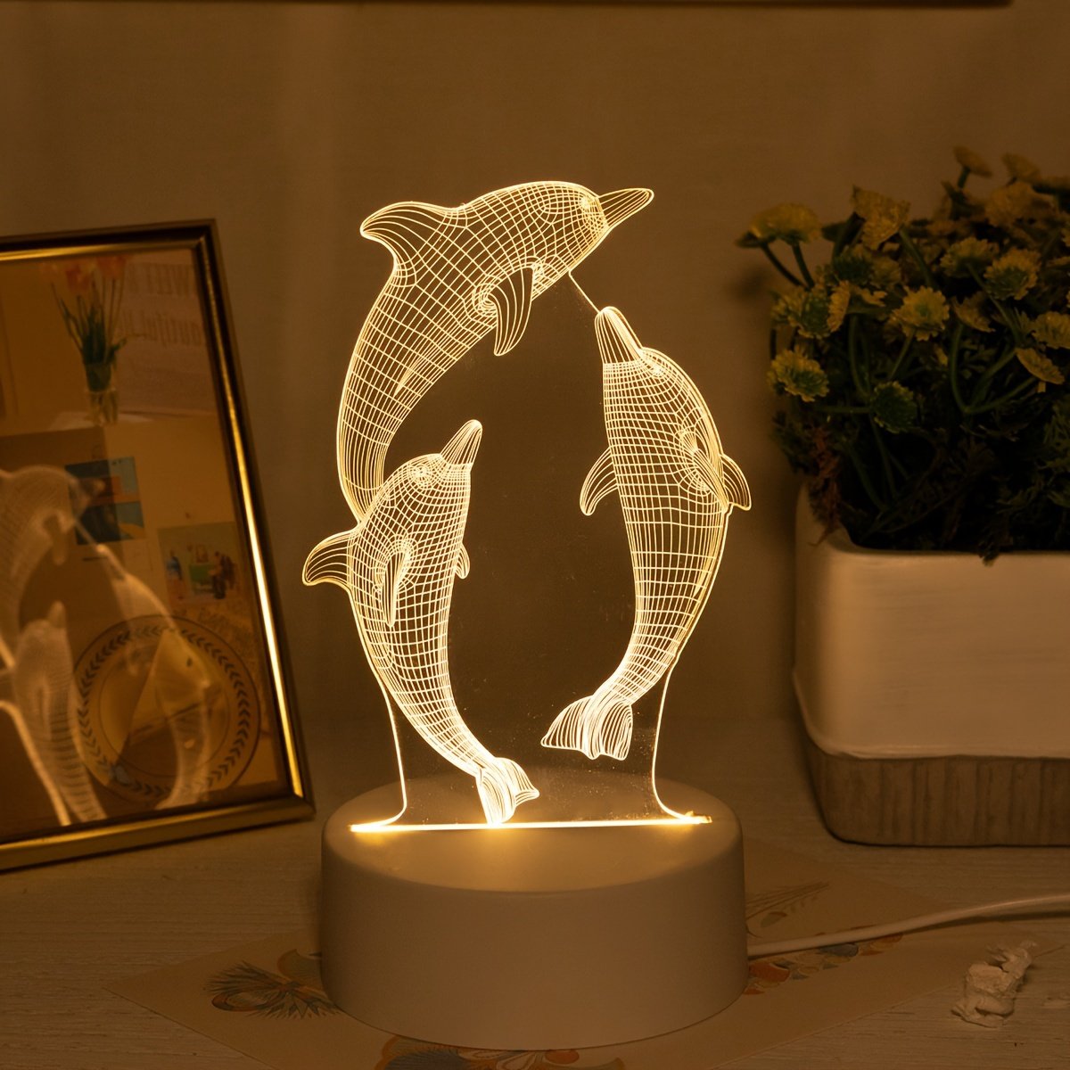 Lámpara de Noche LED 3D Delfín USB Decorativa vista frontal con la luz encendida