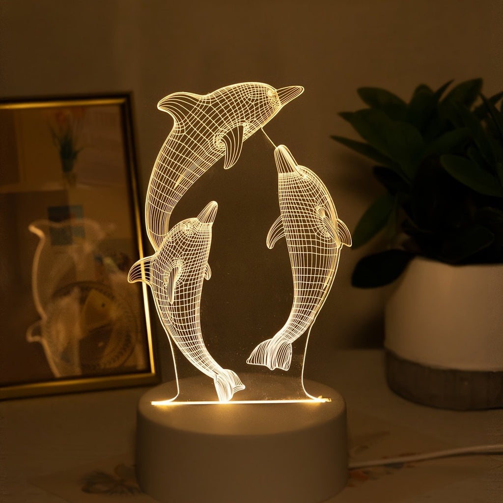 Lámpara de Noche LED 3D Delfín USB Decorativa sobre un buró junto a la cama