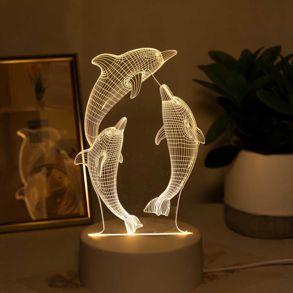 Lámpara de Noche LED 3D Delfín USB Decorativa sobre un buró junto a la cama