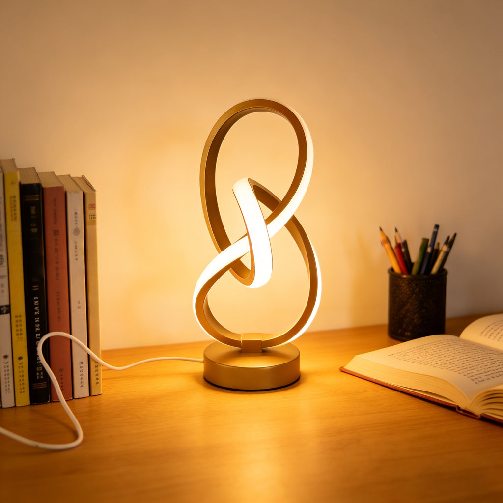 Lámpara de Escritorio Espiral USB Negra y Dorada en una sala moderna como luz de ambiente